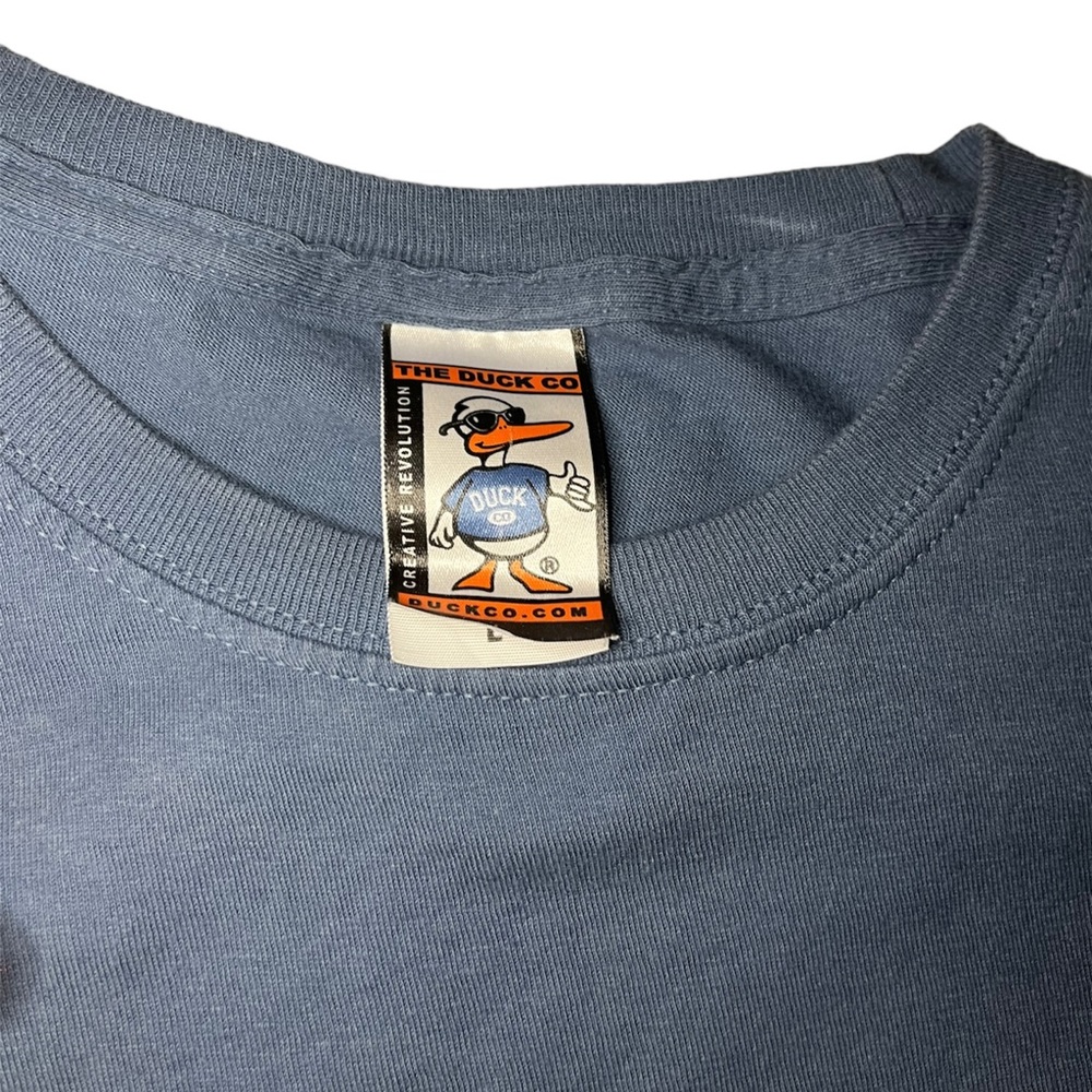 Nice Tshirt, small discoloration. If interested please reach out.